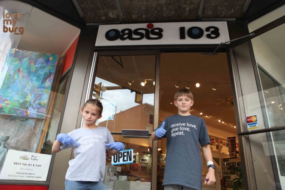 children with thumbs up