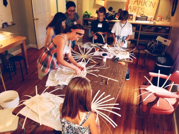 kids weaving baskets
