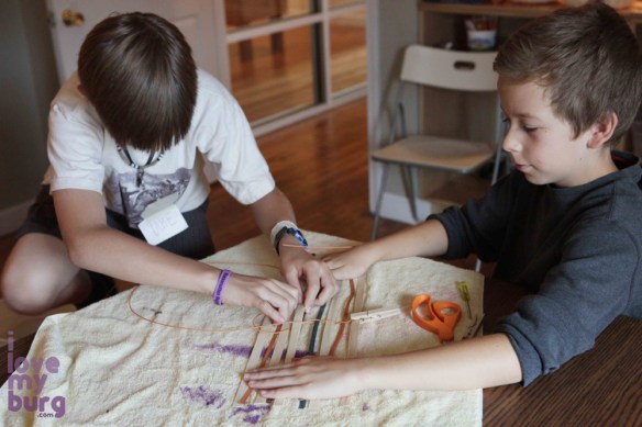 boys weaving pouch basket