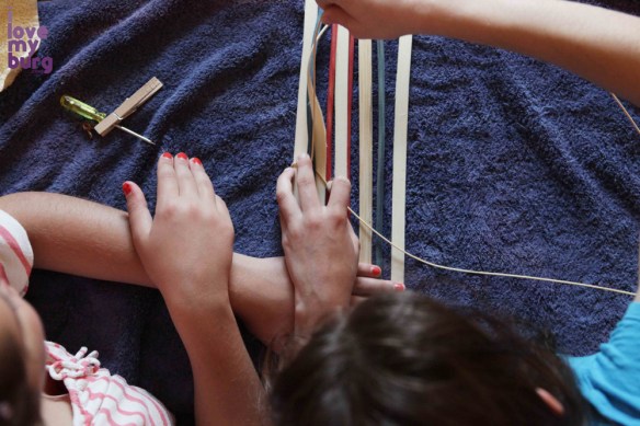 hands making pouch baskets