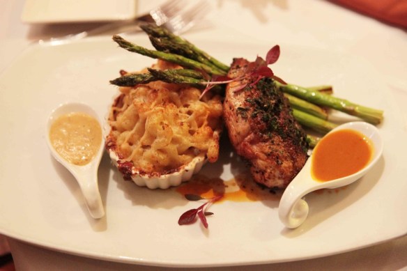 plate with chicken and mac n cheese